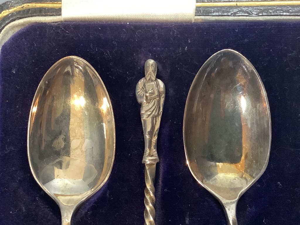 A cased set of six George V silver apostle teaspoons and a pair of sugar tongs, Cooper Brothers & Sons, Sheffield, 1921.